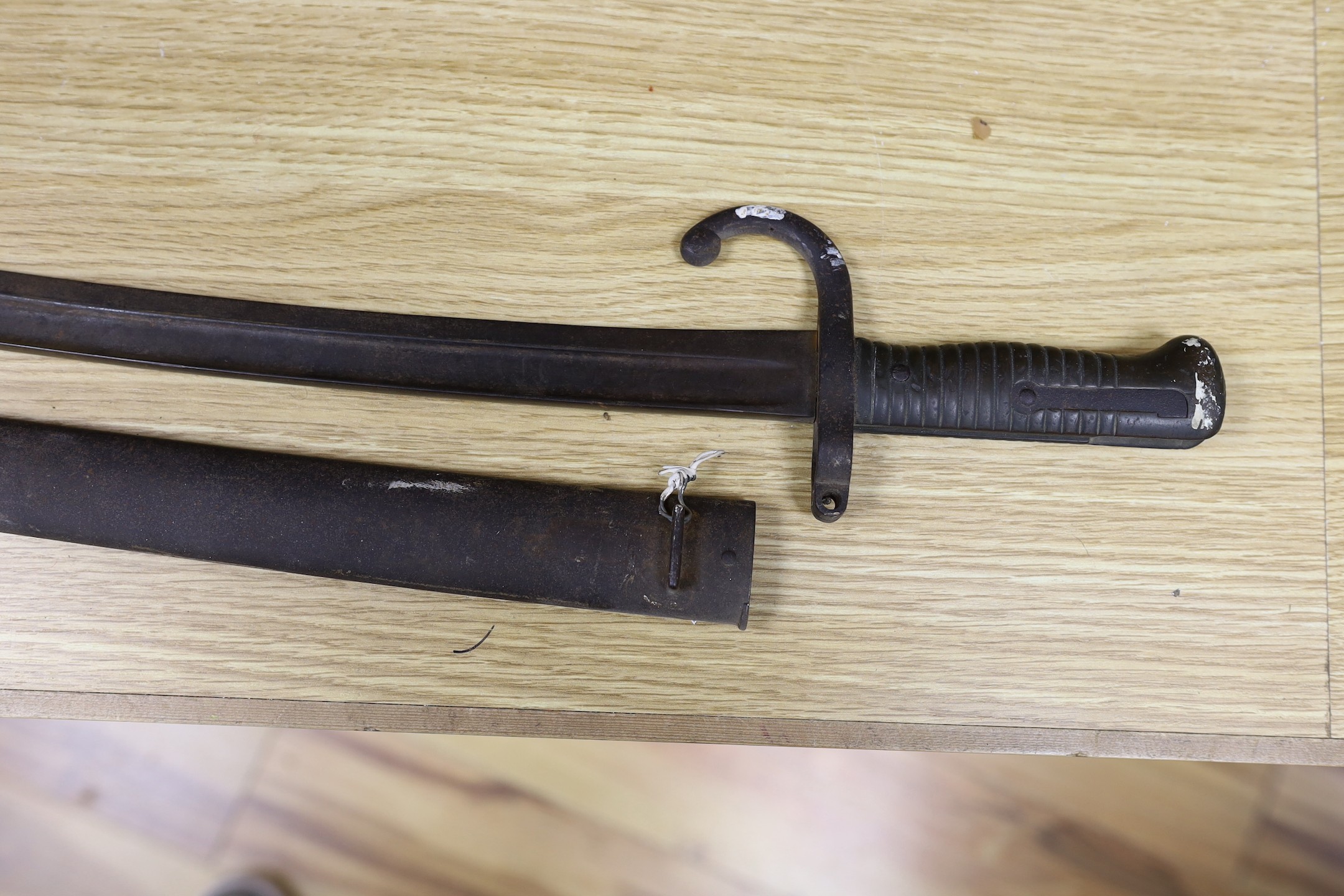 A Victorian Metropolitan police truncheon and a bayonet, truncheon 43 cms long